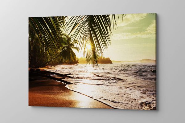 Obraz na płótnie zachód słońca na tropikalnej plaży