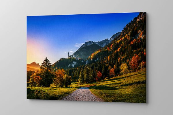 Obraz na płótnie kolorowy pejzaż na tle niebieskiego nieba