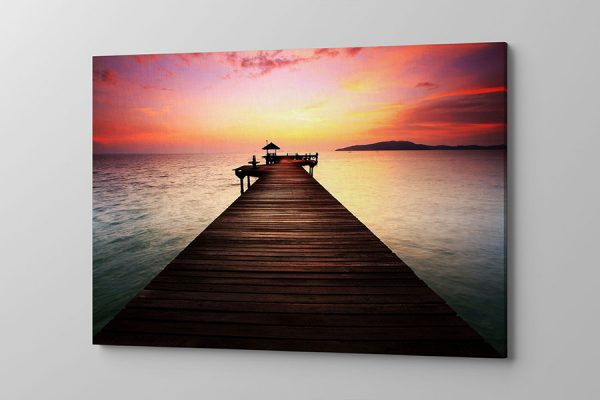 Obraz na płótnie pomost o zachodzie słońca