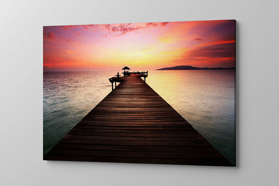 Obraz na płótnie pomost o zachodzie słońca